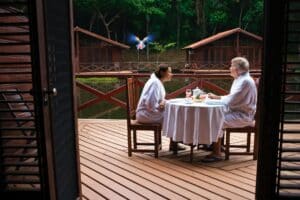 people eating on house deck