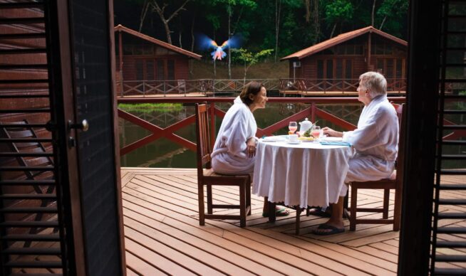 people eating on house deck
