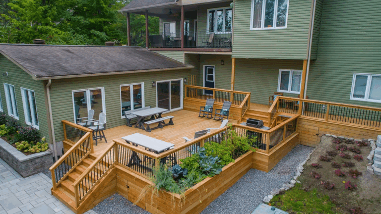 Beautiful multi tier custom deck with stairs and railings