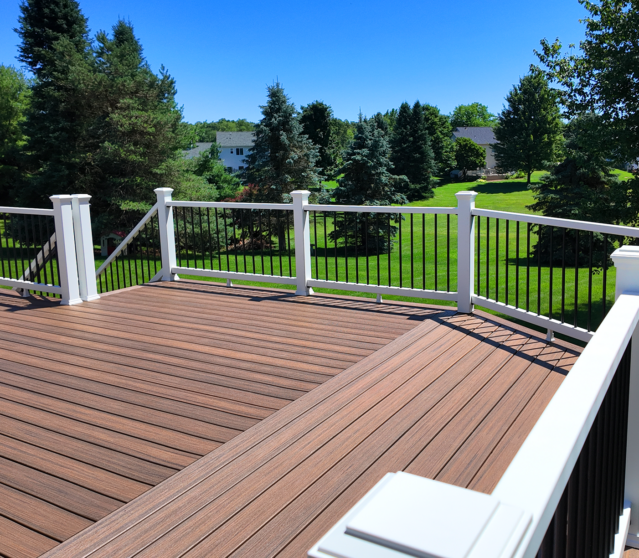 Composit deck with lawn chair overlooking golf course