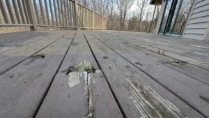 Neglected deck in need of repair or replacement