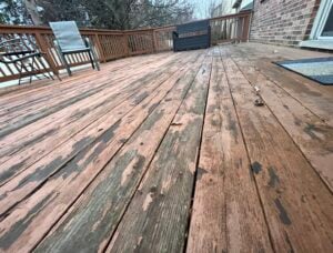 Neglected deck in need of repair or replacement