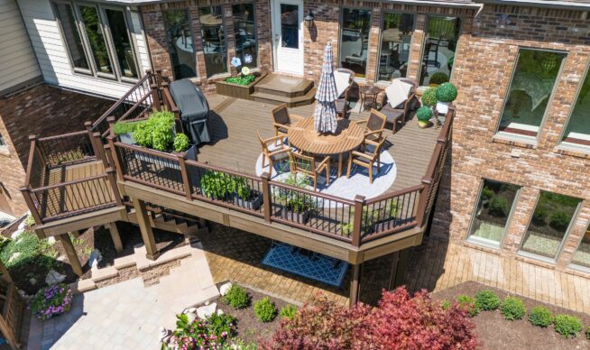 An image of a completed custom composite deck with metal railing