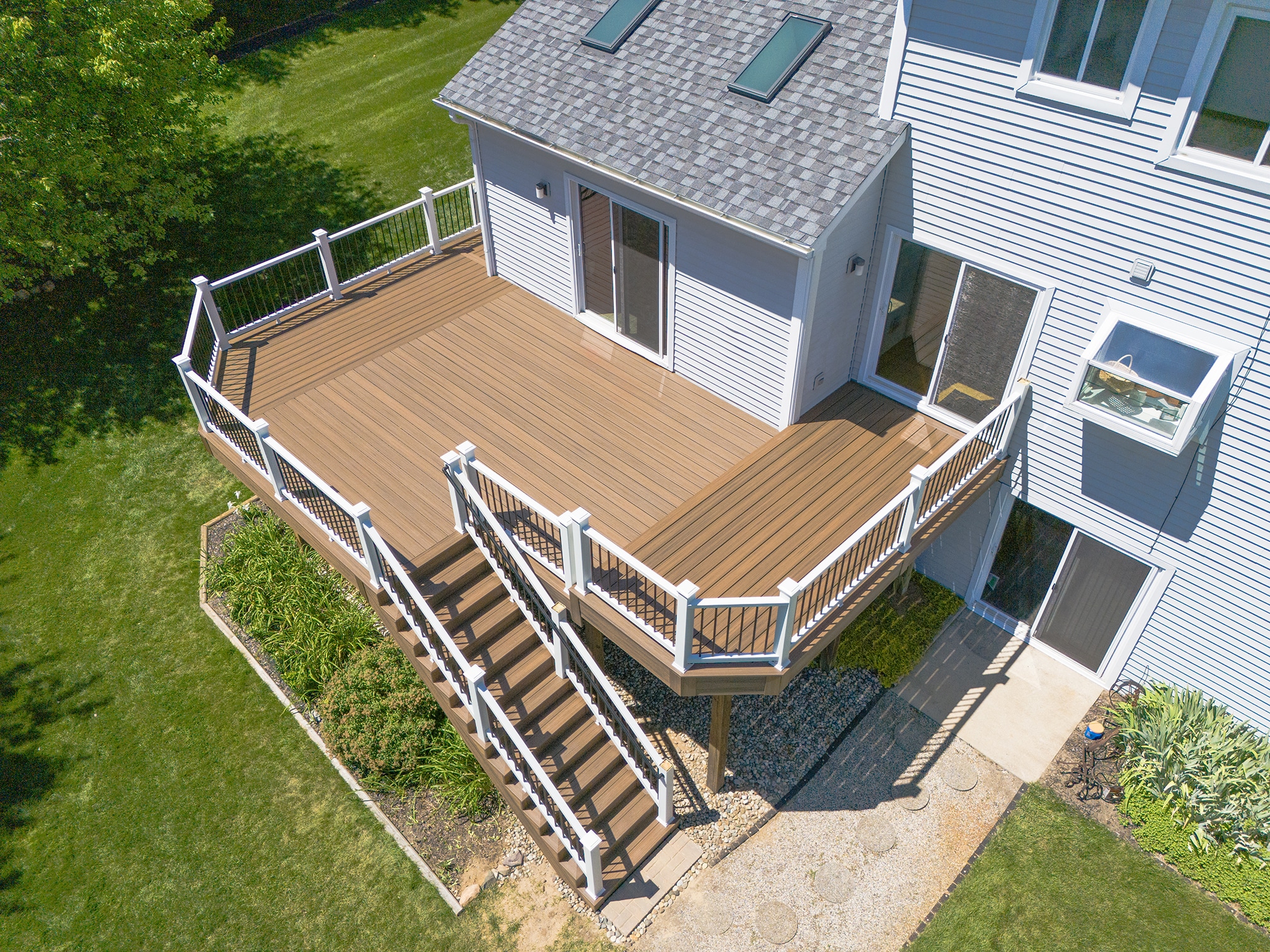 Aerial view of custom composite deck with stairs overlooking golf course