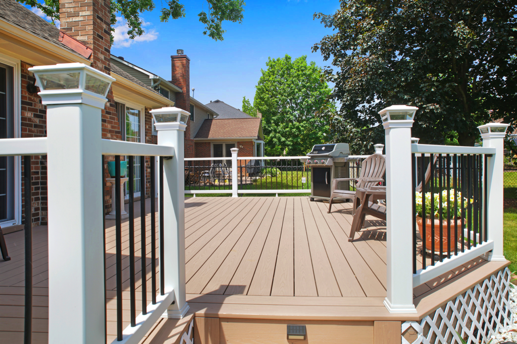 Low attached deck with metal railing and composite surface
